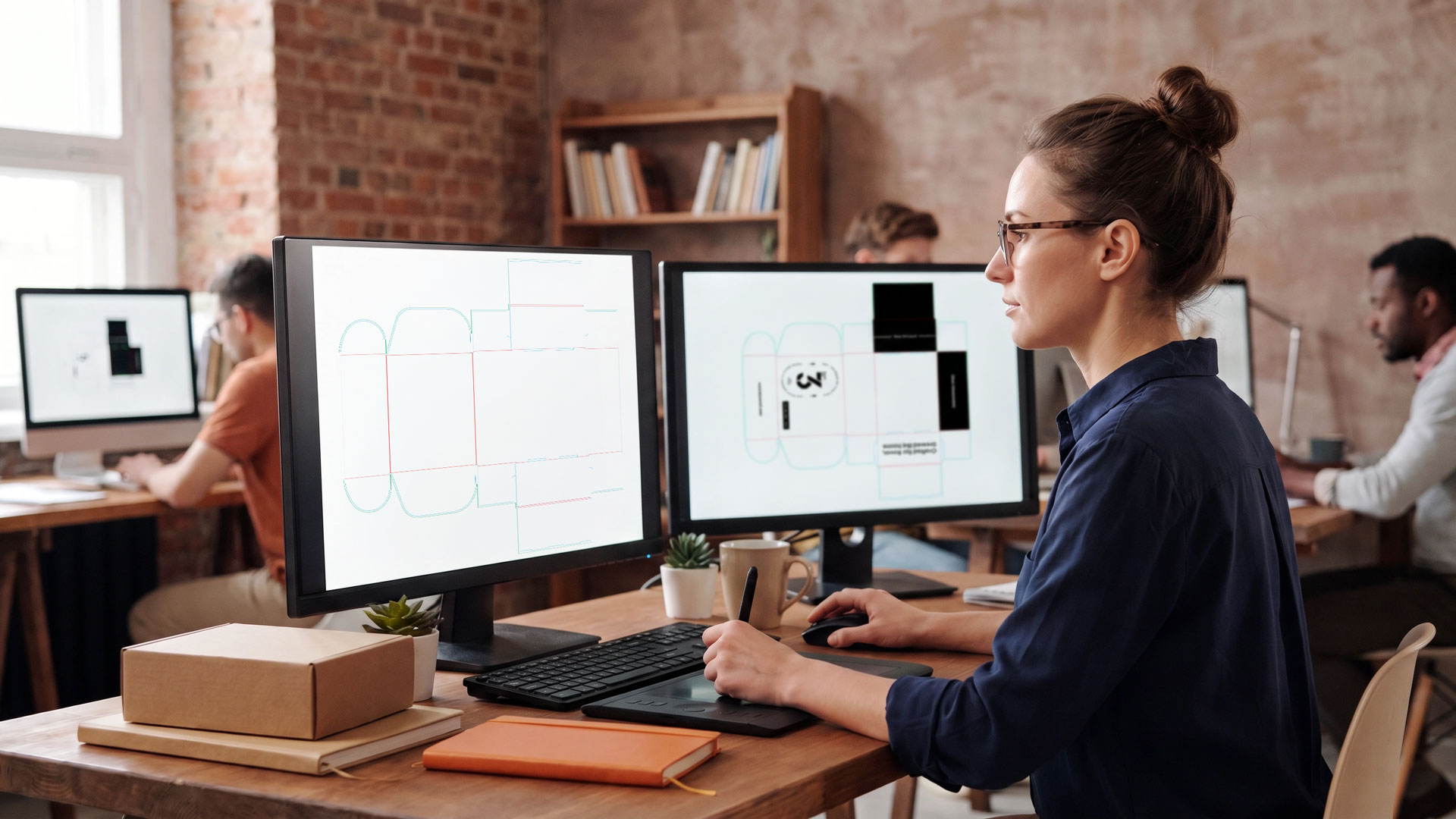 Working on a mailer box dieline template on dual monitors