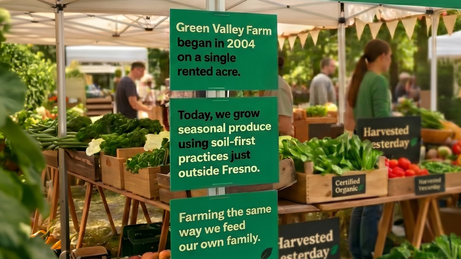 Informational farm signs displayed at a market booth