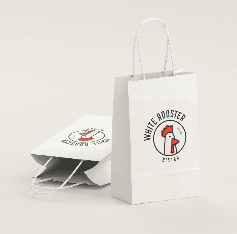A paper takeout bag with a restaurant logo