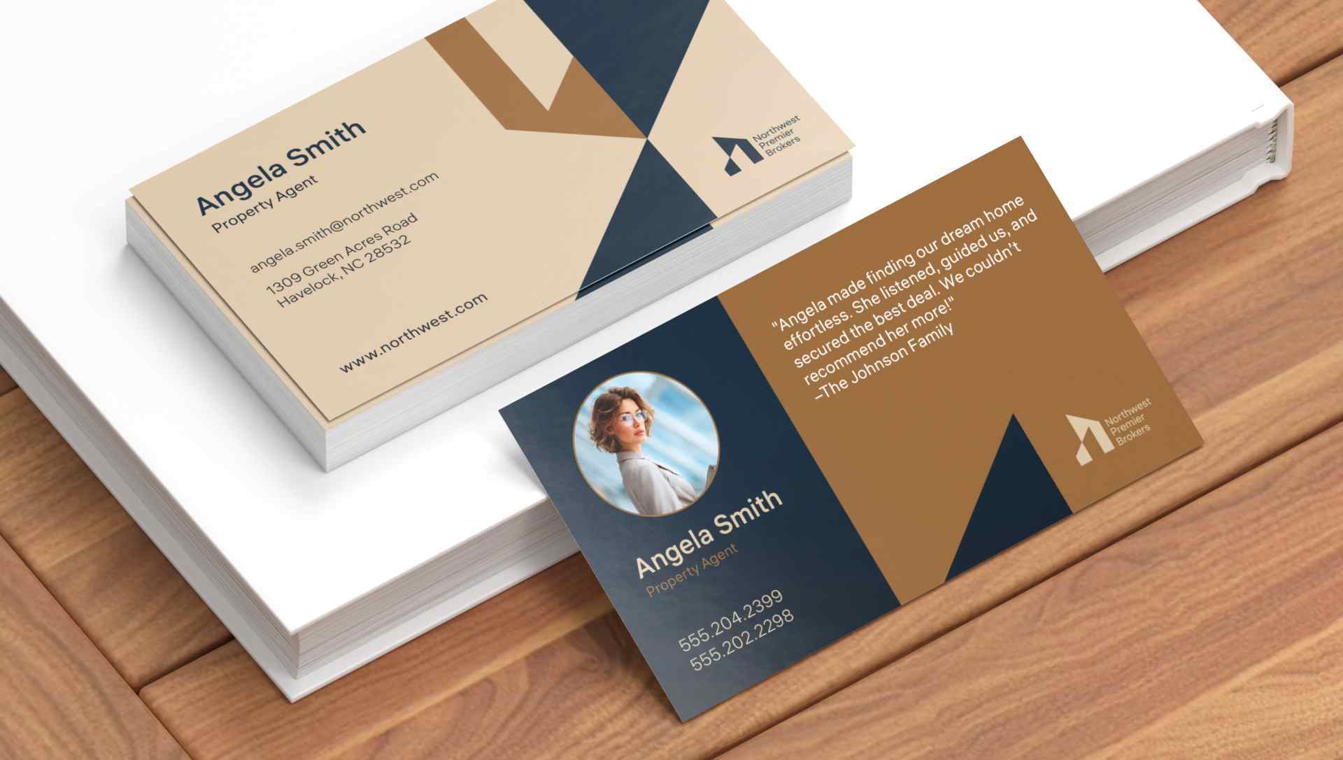 Business cards on a wooden surface showcasing different finishes