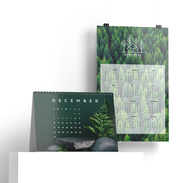 Forest-themed wall and desk calendars with decorative foliage.