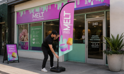 Assembled feather flag displayed outside a storefront