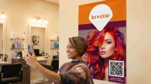 Smiling woman taking selfie near poster